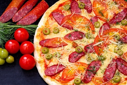 Пицца со скидкой 50% с круглосуточной доставкой от «Итальяно Пицца»