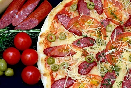 Пицца со скидкой 50% с круглосуточной доставкой от «Итальяно Пицца»