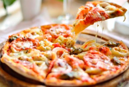 Пицца и пироги со скидкой 65% от кафе доставки «КОК»